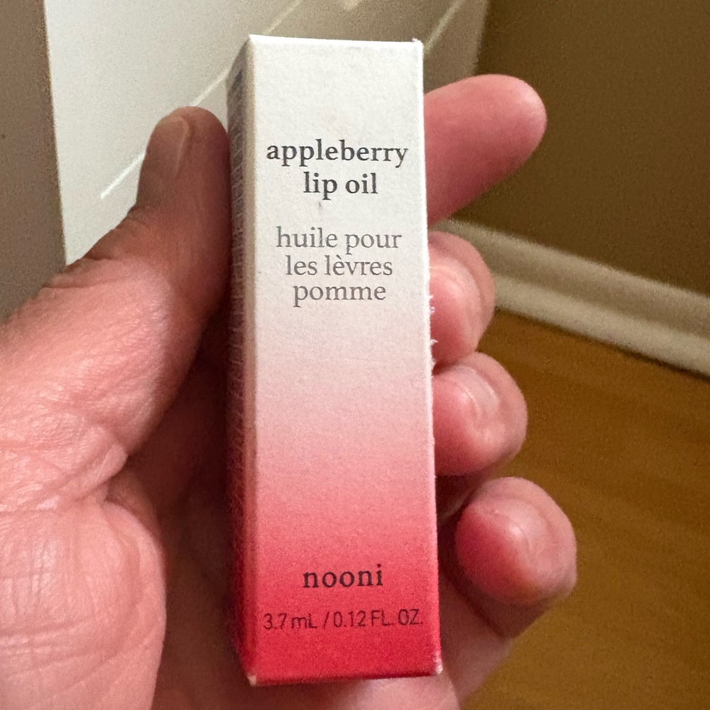 Nooni Appleberry Lip Oil,brand new never opened.